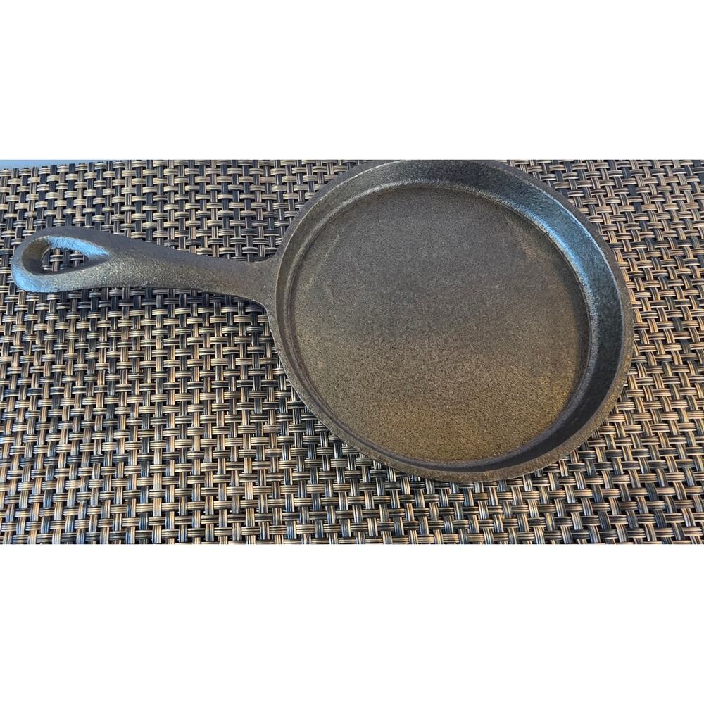 Cast iron Miniature Frying Pan Diameter is 4.5 inches and.5 inches deep